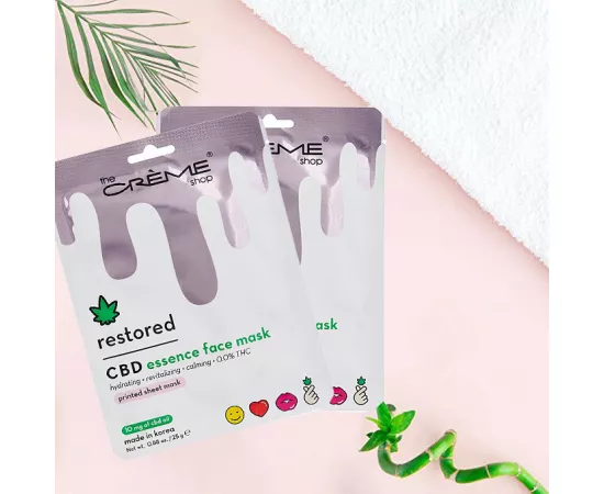 The Crème Shop Restored CBD Essence Printed Face Mask